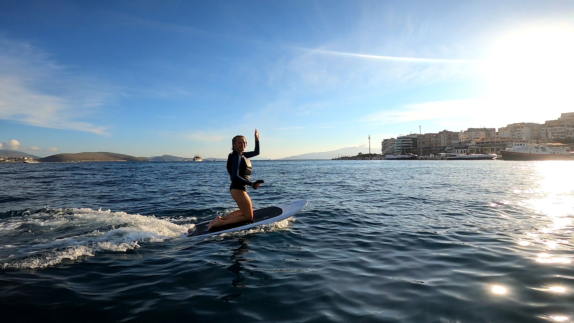 eFoil rider gliding across the bay at sunset